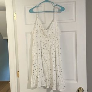 White mini dress with black polka dots